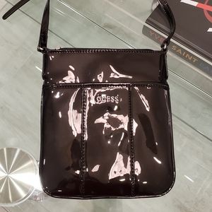 EUC - Guess black patent crossbody bag.